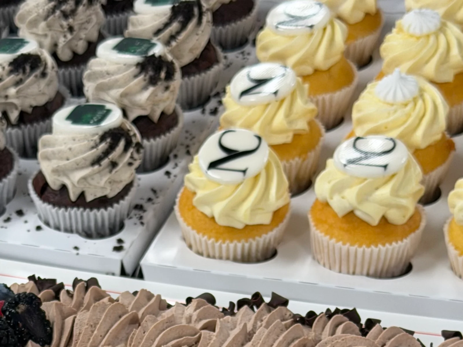 Muffins med Norcom- og Salko-logo under 10-årsfeiringen